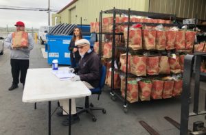 Volunteers outside at drive-thru grocery pick-up at Community FoodBank of San Benito County