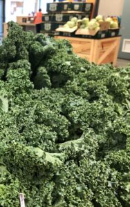 Fresh kale on display inside marketplace at Community FoodBank in Hollister, CA