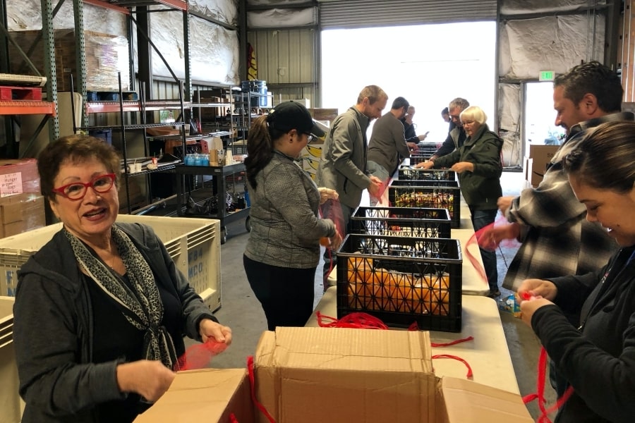 Volunteers packing student snack bags at Community Food Bank of San Benito County