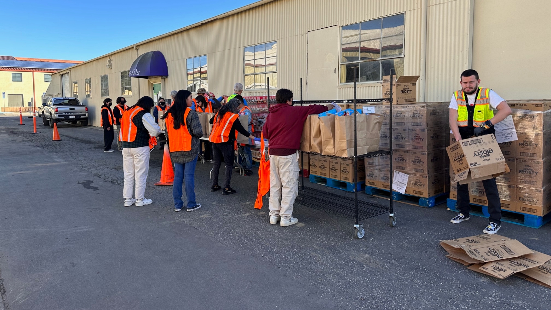 Community Food Bank of San Benito County works with volunteers to distribute food.